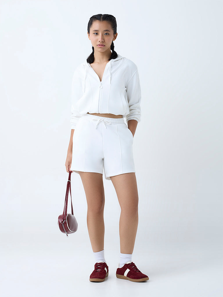 Westside Studiofit Women's White Solid Hooded Jacket for Sports Wear Full View