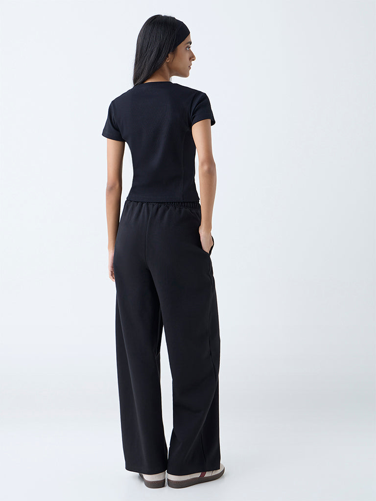 Westside Studiofit Women's Black Ribbed-Textured Cotton-Blend T-Shirt for Sports Wear Back View