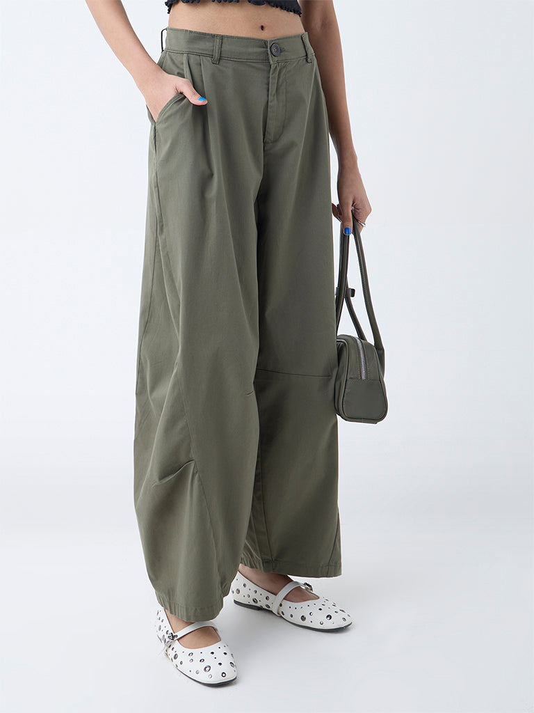 Westside Nuon Women's Olive Mid-Rise Cotton-Blend Baggy Trousers for Casual Wear Front view