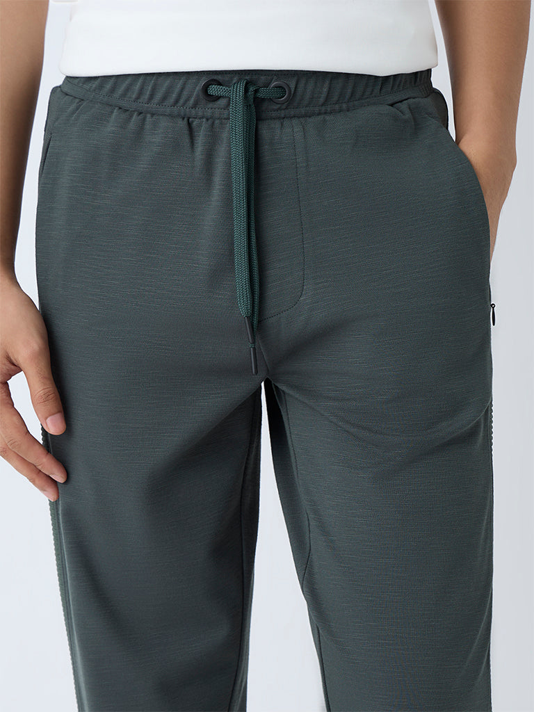 Westside Studiofit Men's Green Relaxed-Fit Mid-Rise Track Pants for Sports Wear Zoomed View