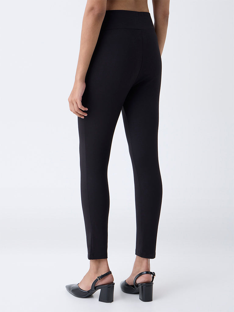 Wardrobe Black Solid Button-Detailed High-Rise Trousers