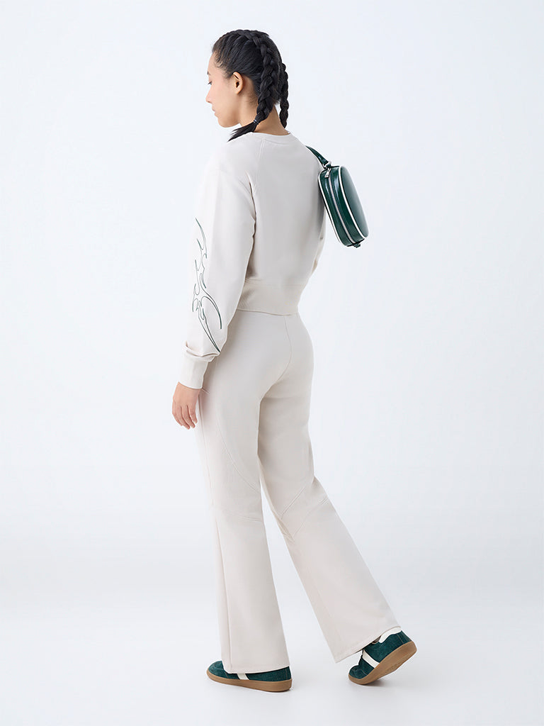 Westside Studiofit Women's Cream Typographic Cotton-Blend Sweatshirt for Winter Wear Back View