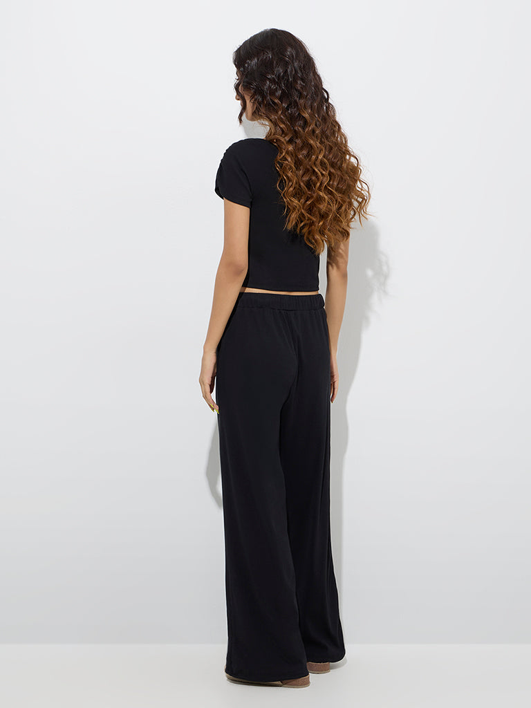 Superstar Black Ribbed High-Rise Cotton-Blend Pants