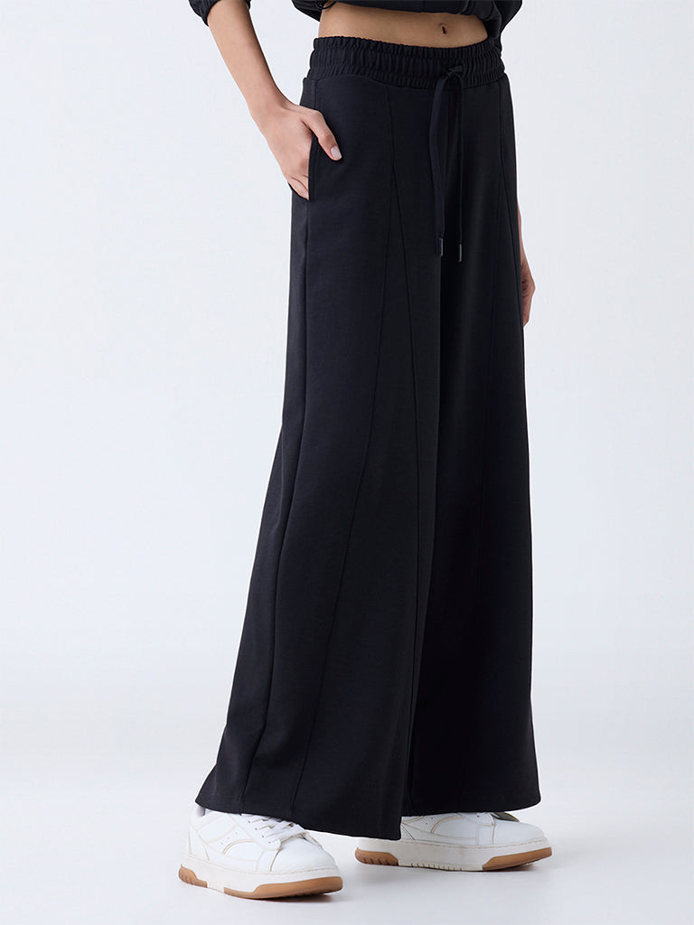 Studiofit Black Solid High-Rise Flared Pants