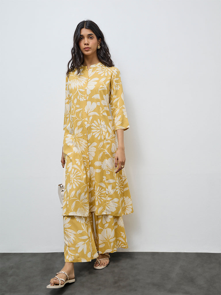 Buy Utsa Yellow Floral Printed Palazzos from Westside