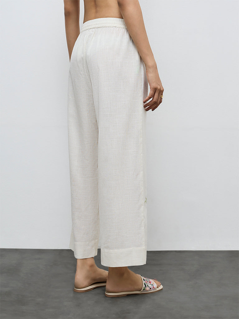 Utsa Off-White Floral Embroidered Cotton Pants