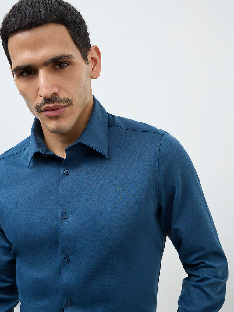 Buy WES Formals Teal Solid Slim-Fit Cotton-Blend Shirt from Westside Buy WES Formals Teal Solid Slim-Fit Cotton-Blend Shirt from Westside