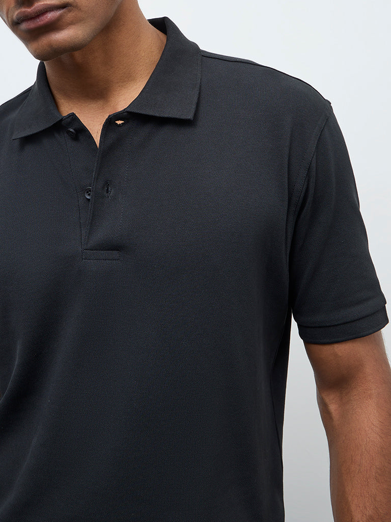 WES Casuals Black Solid Relaxed-Fit Polo T-Shirt