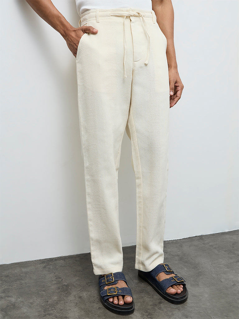 ETA Off-White Textured Relaxed-Fit Mid-Rise Cotton Chinos
