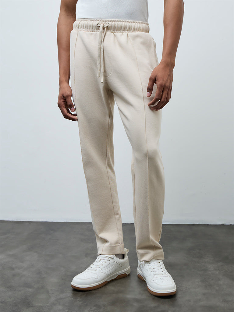 Nuoflexx Off-White Relaxed-Fit Mid-Rise Cotton-Blend Track Pants