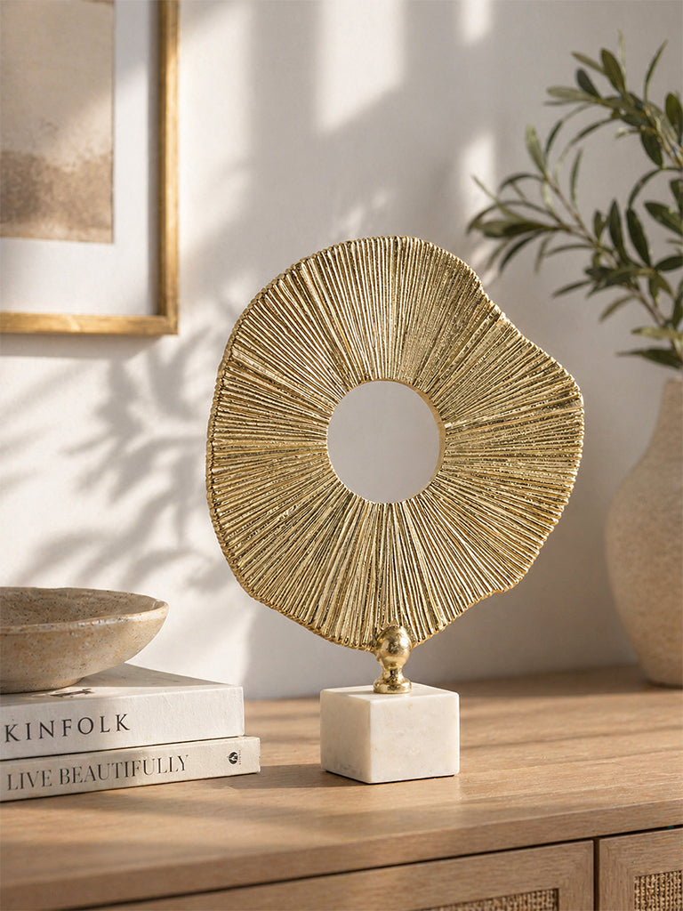 Westside Home Gold Sun Sculpture on Marble Stand