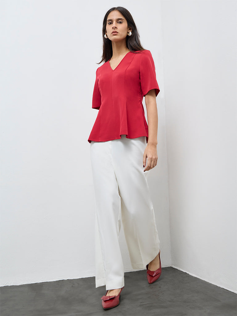 Wardrobe Red Solid Peplum Top