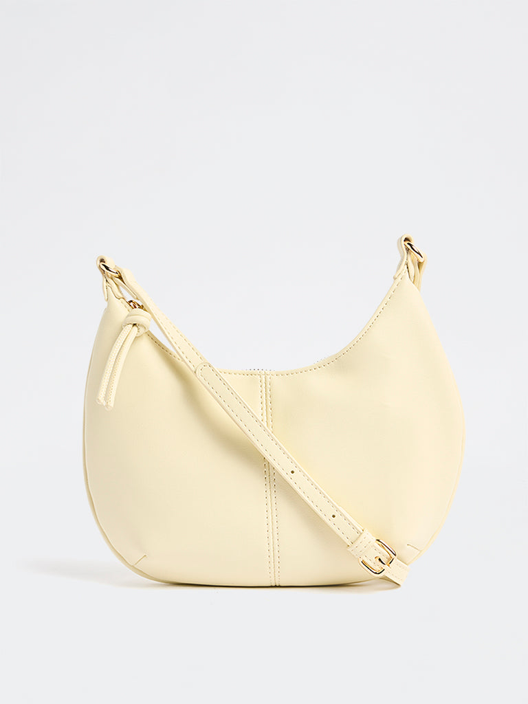Westside Cream Crescent Sling Bag