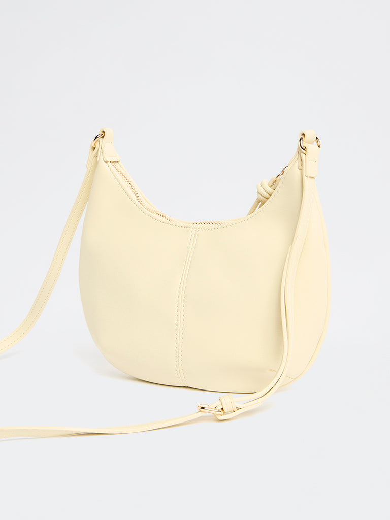 Westside Cream Crescent Sling Bag