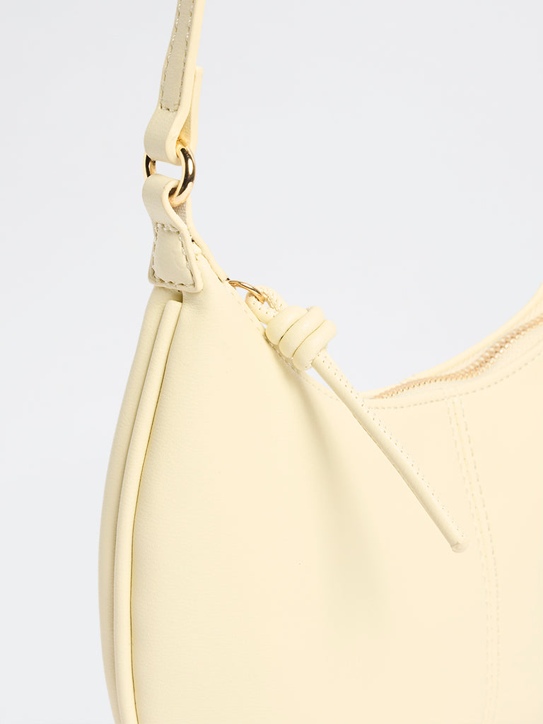 Westside Cream Crescent Sling Bag