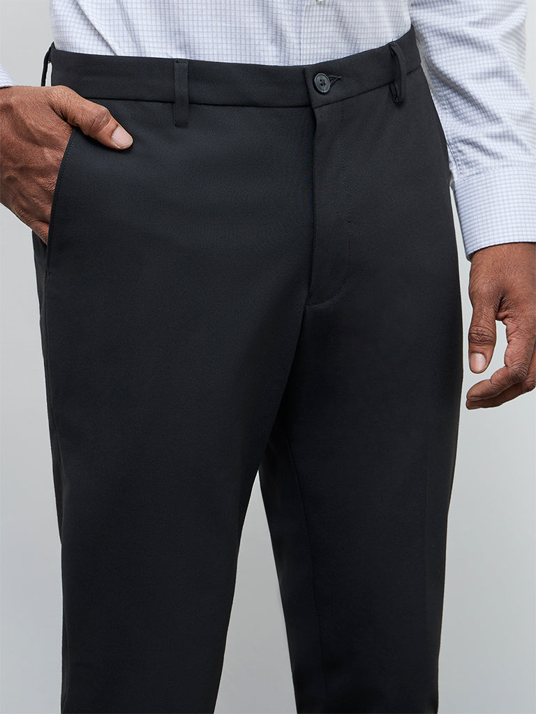 Buy WES Formals Black Solid Ultra Slim Fit Mid-Rise Trousers from Westside Buy WES Formals Black Solid Ultra Slim Fit Mid-Rise Trousers from Westside