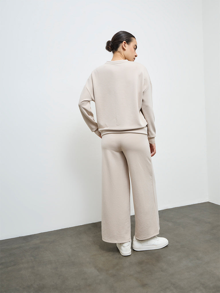 Nuoflexx Beige High-Rise Pants