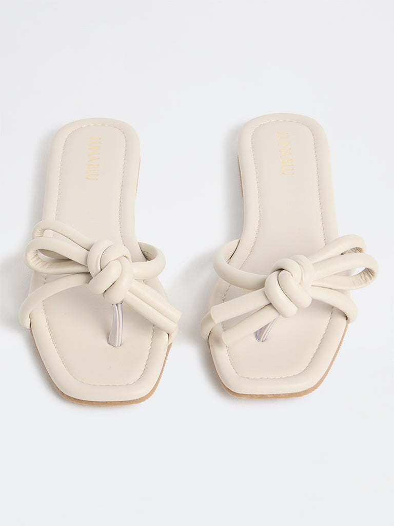 LUNA BLU Ivory Bow-Design Puffed Slides