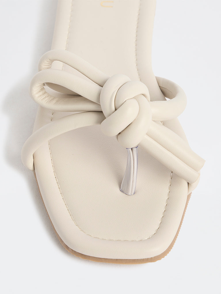 LUNA BLU Ivory Bow-Design Puffed Slides