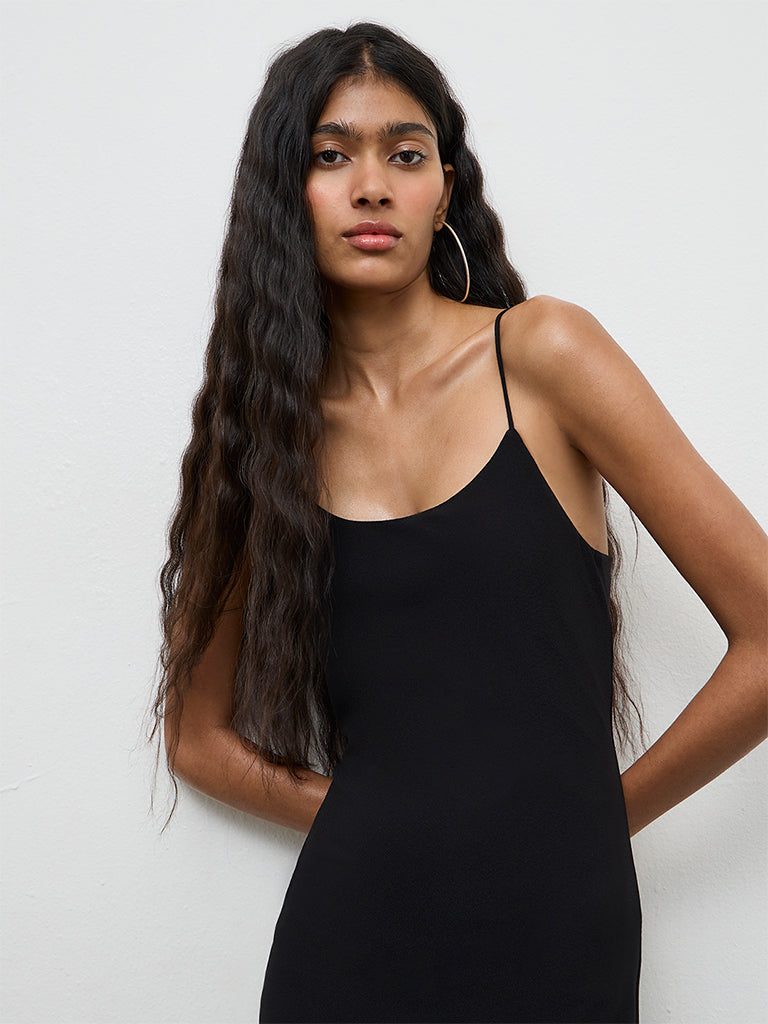 Buy Nuon Black Solid Slit-Detail Bodycon Dress from Westside Buy Nuon Black Solid Slit-Detail Bodycon Dress from Westside