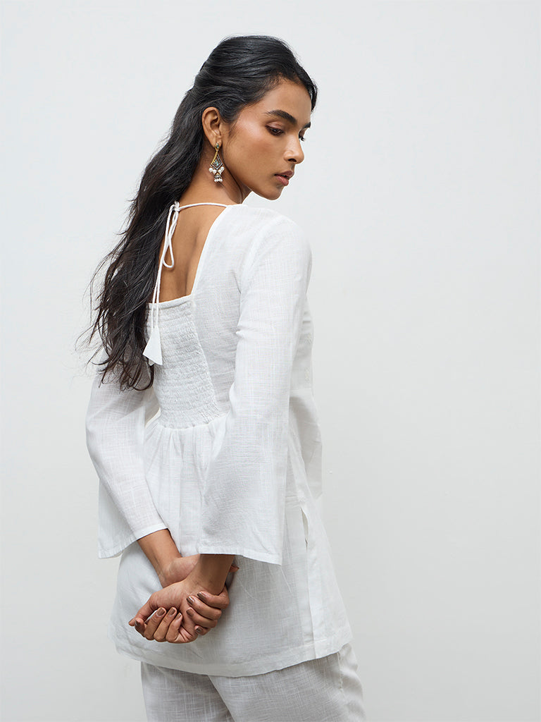 Utsa White Floral Embroidered Cotton Kurti