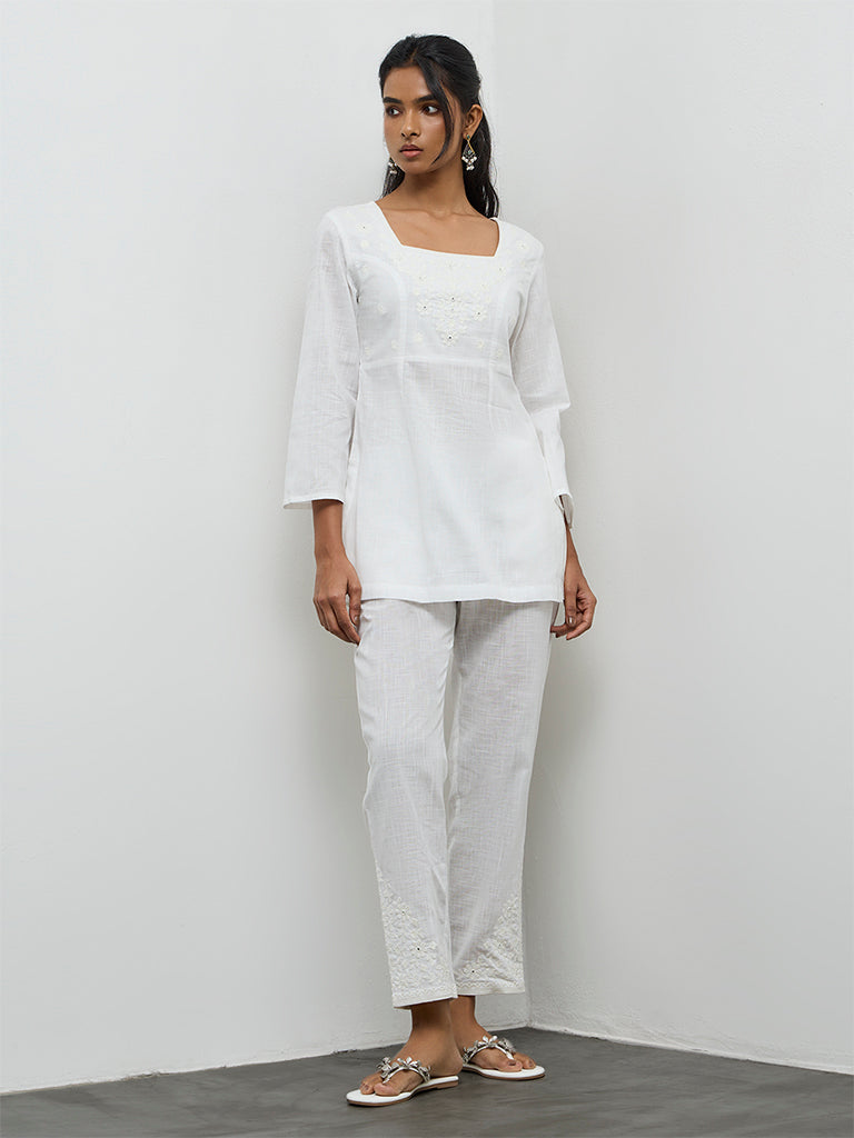Utsa White Floral Embroidered Cotton Slim Pants