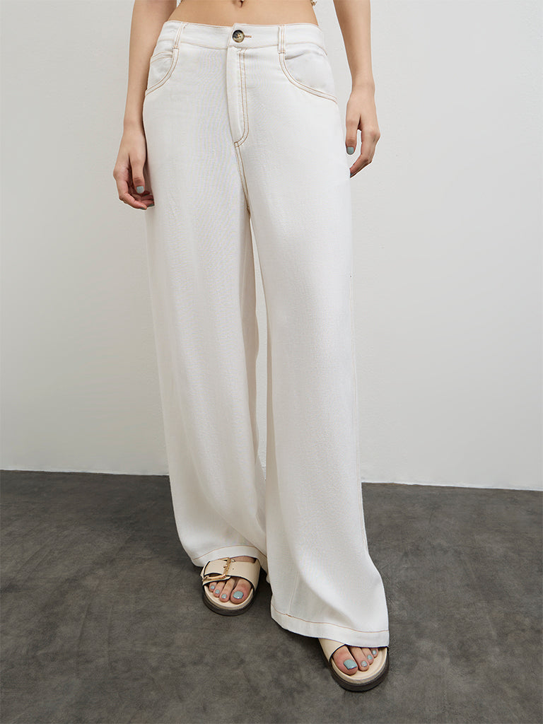 Nuon Off-White Flared High-Rise Cotton Trousers