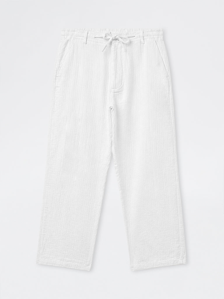 ETA Off-White Textured Relaxed-Fit Mid-Rise Cotton Pants
