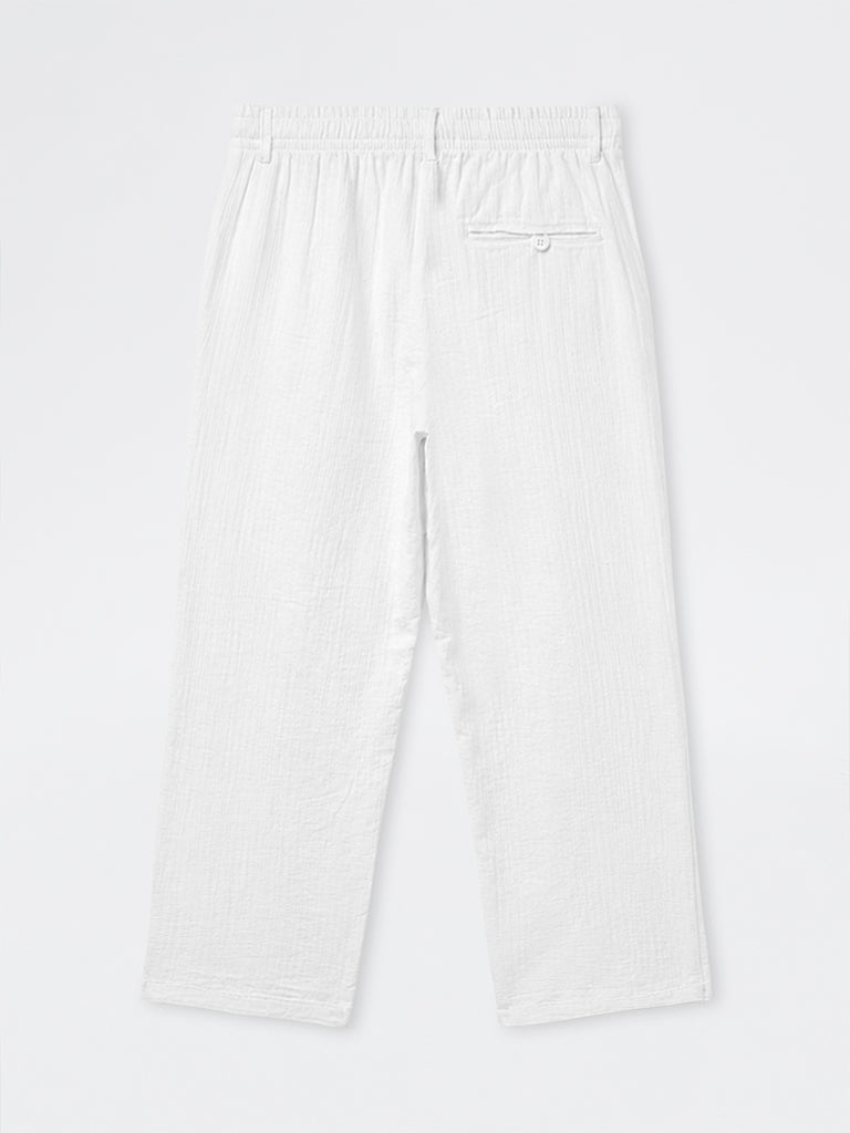 ETA Off-White Textured Relaxed-Fit Mid-Rise Cotton Pants