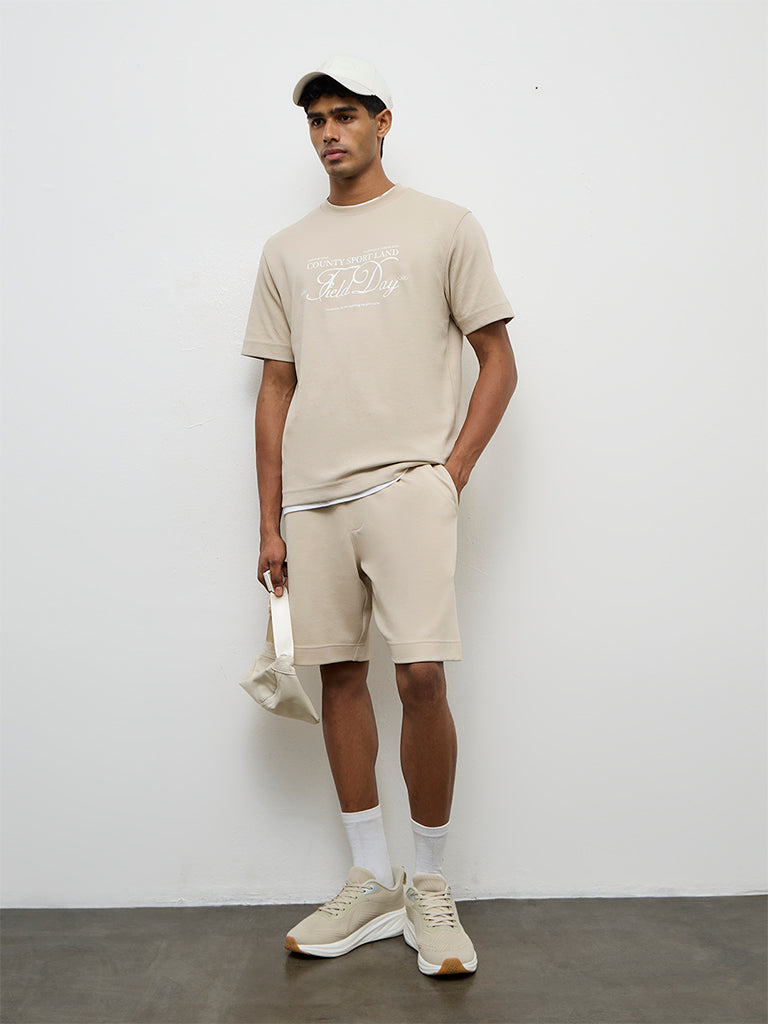 Nuoflexx Beige Text Printed Relaxed-Fit Cotton-Blend T-Shirt