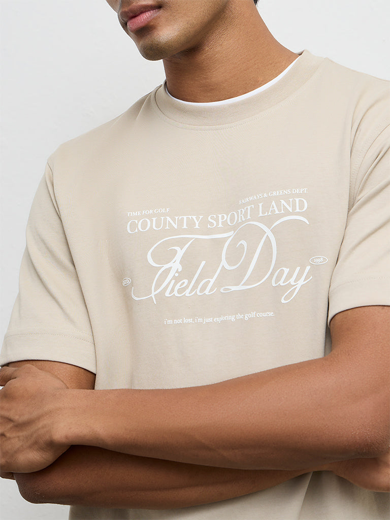 Nuoflexx Beige Text Printed Relaxed-Fit Cotton-Blend T-Shirt