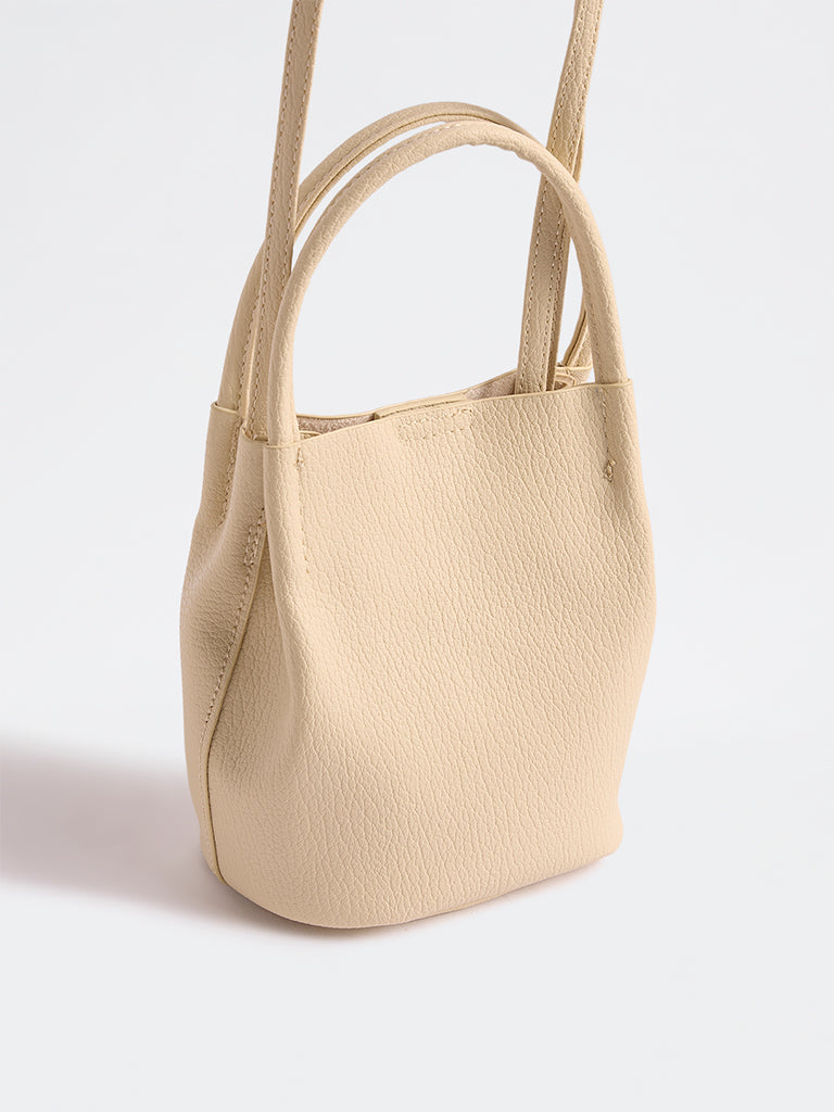 Westside Cream Textured Mobile Sling Bag with a Pouch
