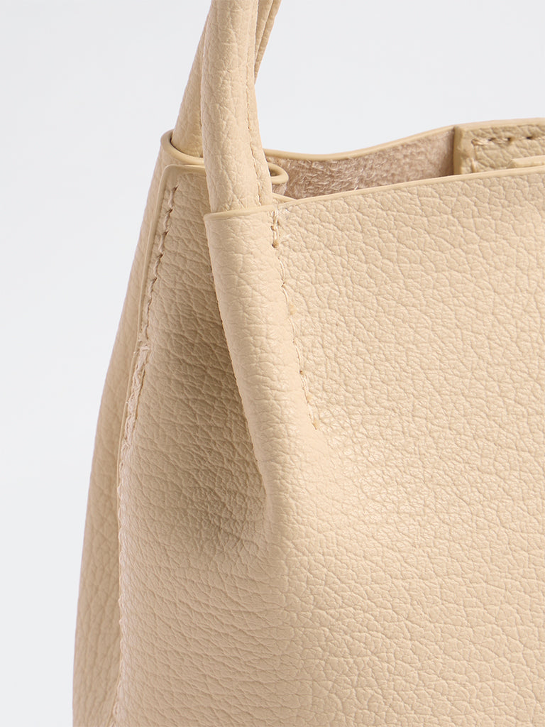 Westside Cream Textured Mobile Sling Bag with a Pouch