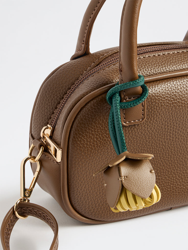 Westside Dark Brown Textured Sling Bag with a Floral Bag Charm