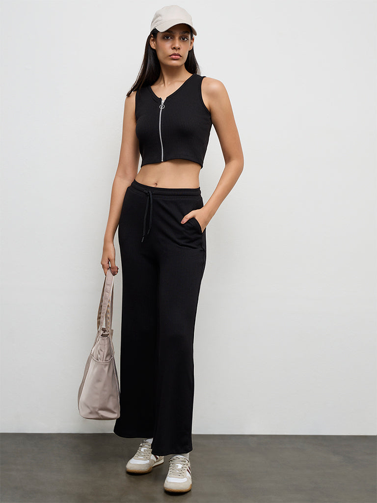 Buy Nuoflexx Black Ribbed Zip-Front Top from Westside