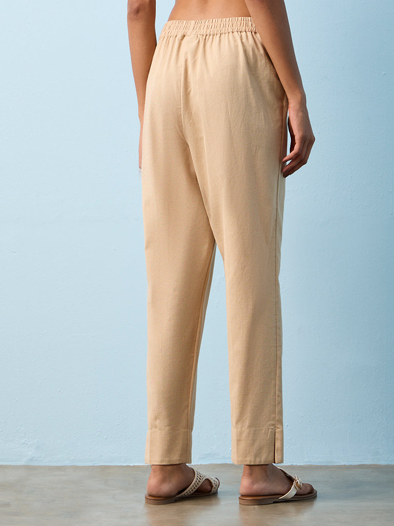 Utsa Beige Solid Cotton-Blend Pants