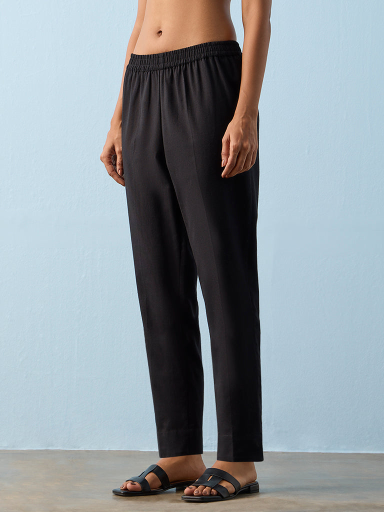 Utsa Black Solid Cotton-Blend Pants
