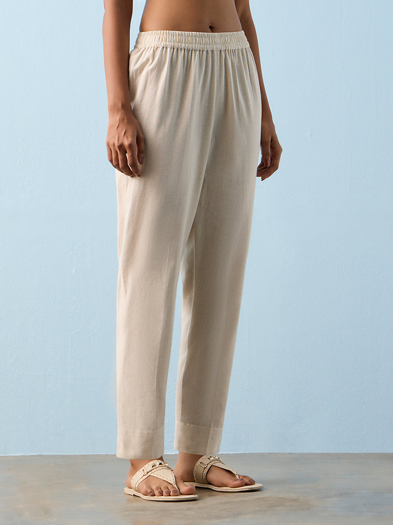 Utsa Beige Solid Cotton-Blend Pants