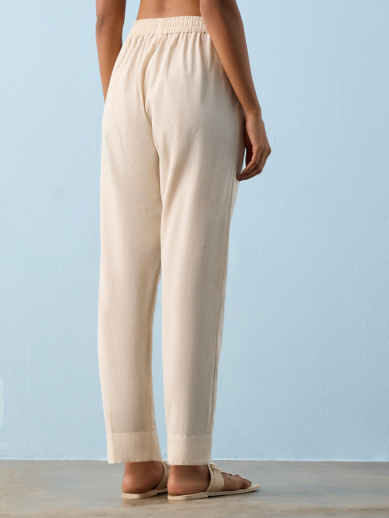 Utsa Beige Solid Cotton-Blend Pants
