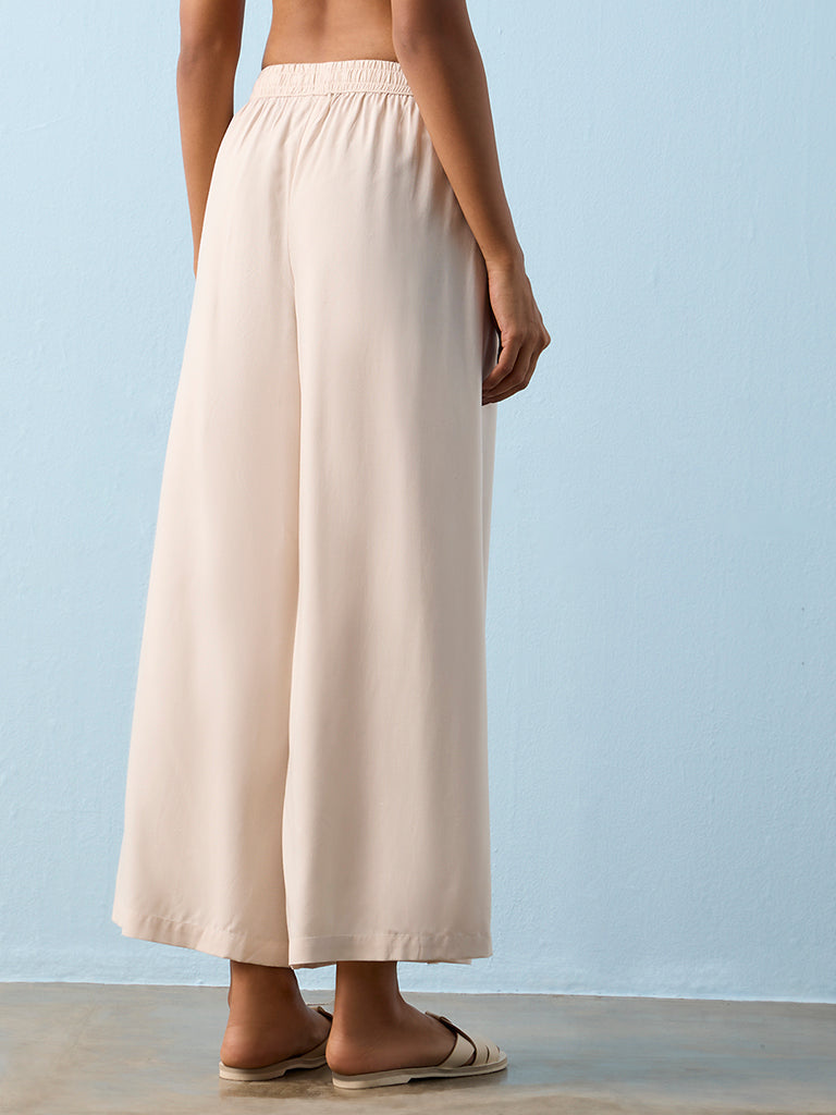 Utsa Beige Solid Palazzos