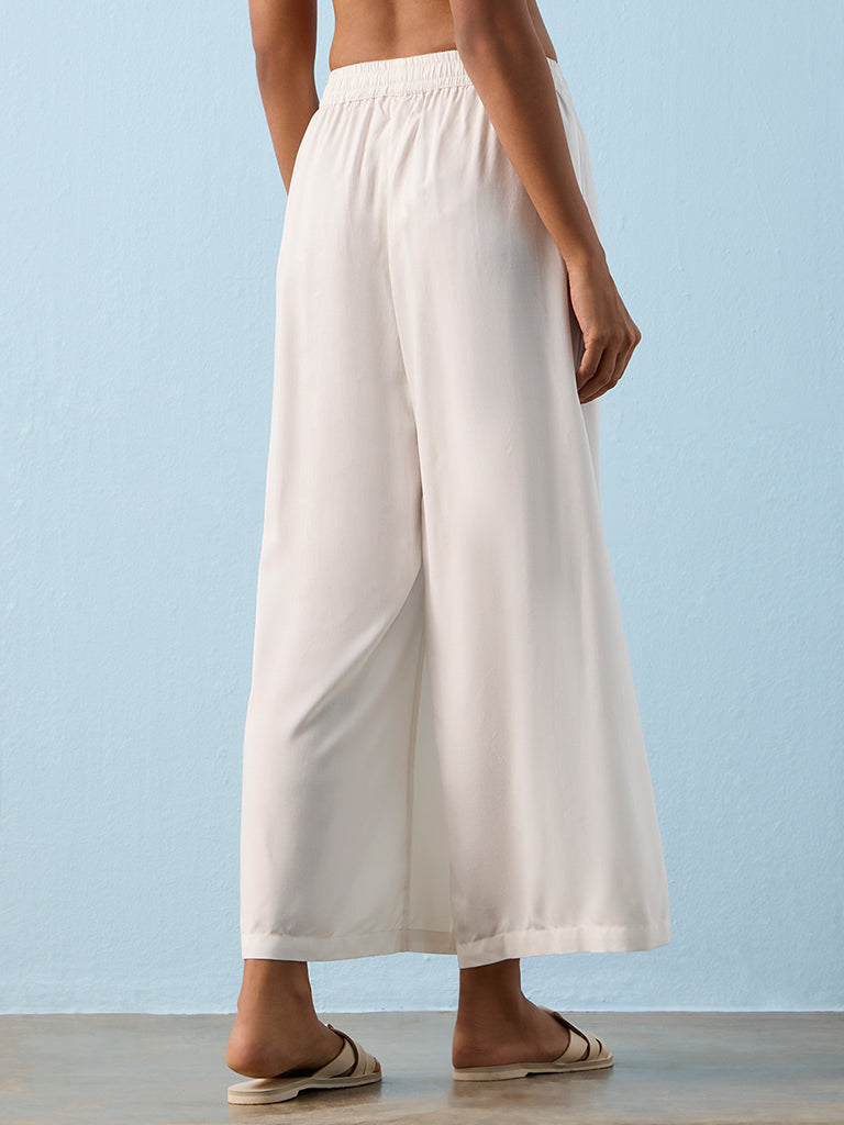 Utsa White Solid Palazzos