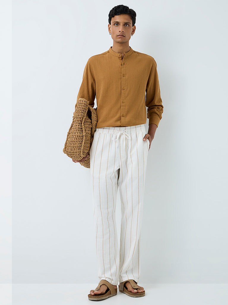 ETA Off-White Striped Relaxed-Fit Cotton Chinos
