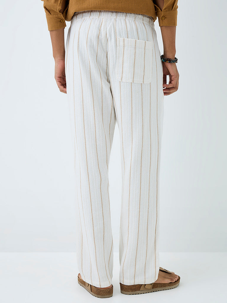 ETA Off-White Striped Relaxed-Fit Cotton Chinos