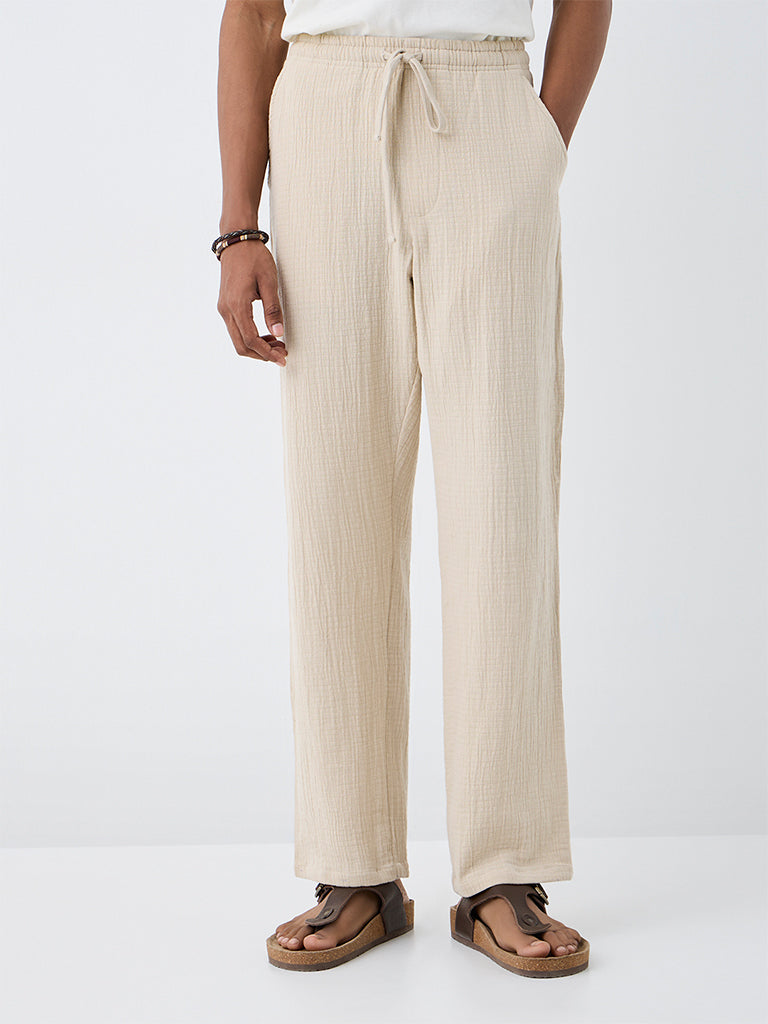 ETA Off-White Textured Relaxed-Fit Mid-Rise Cotton Chinos