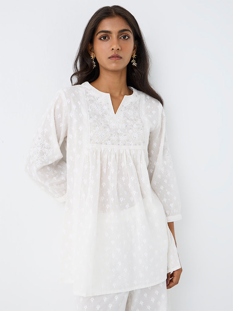 Utsa White Floral Embroidered Cotton Kurti