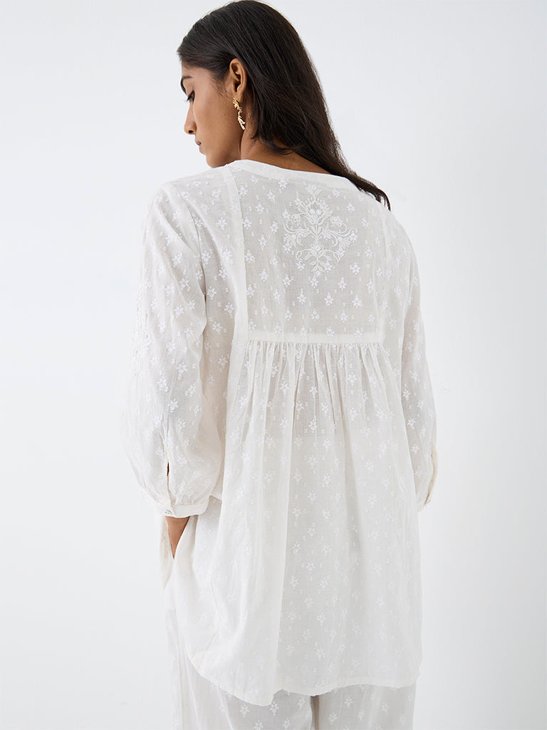 Utsa White Floral Embroidered Cotton Kurti