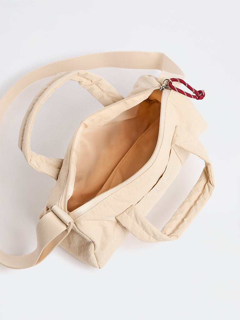 Nuoflexx Beige Text-Detailed Duffle Bag