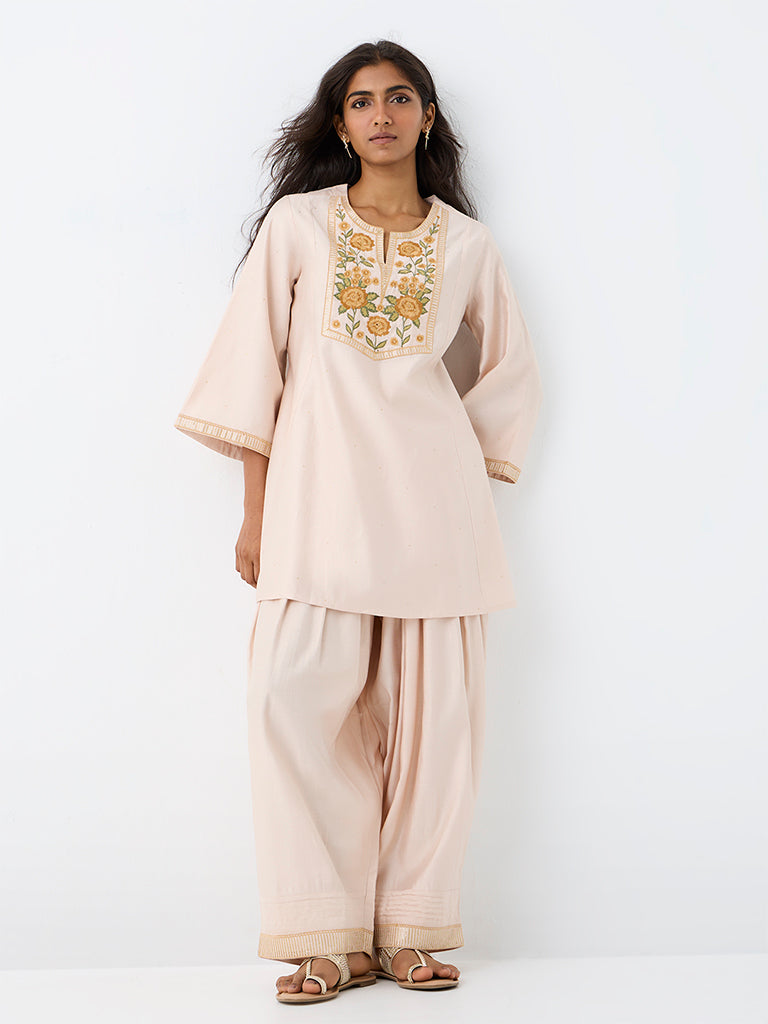 Utsa Light Peach Floral Embroidered Kurti