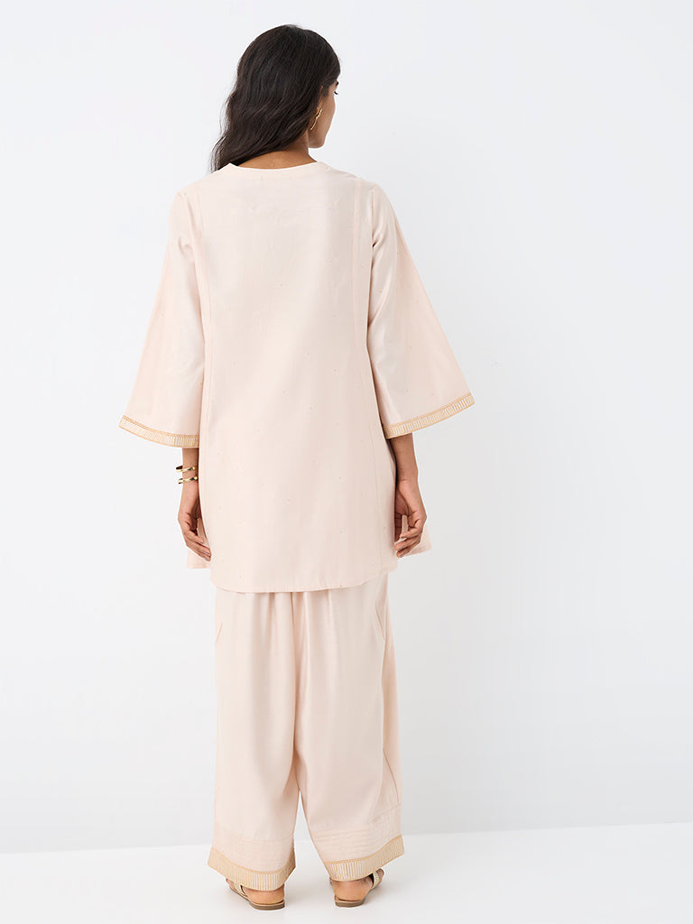 Utsa Light Peach Floral Embroidered Kurti
