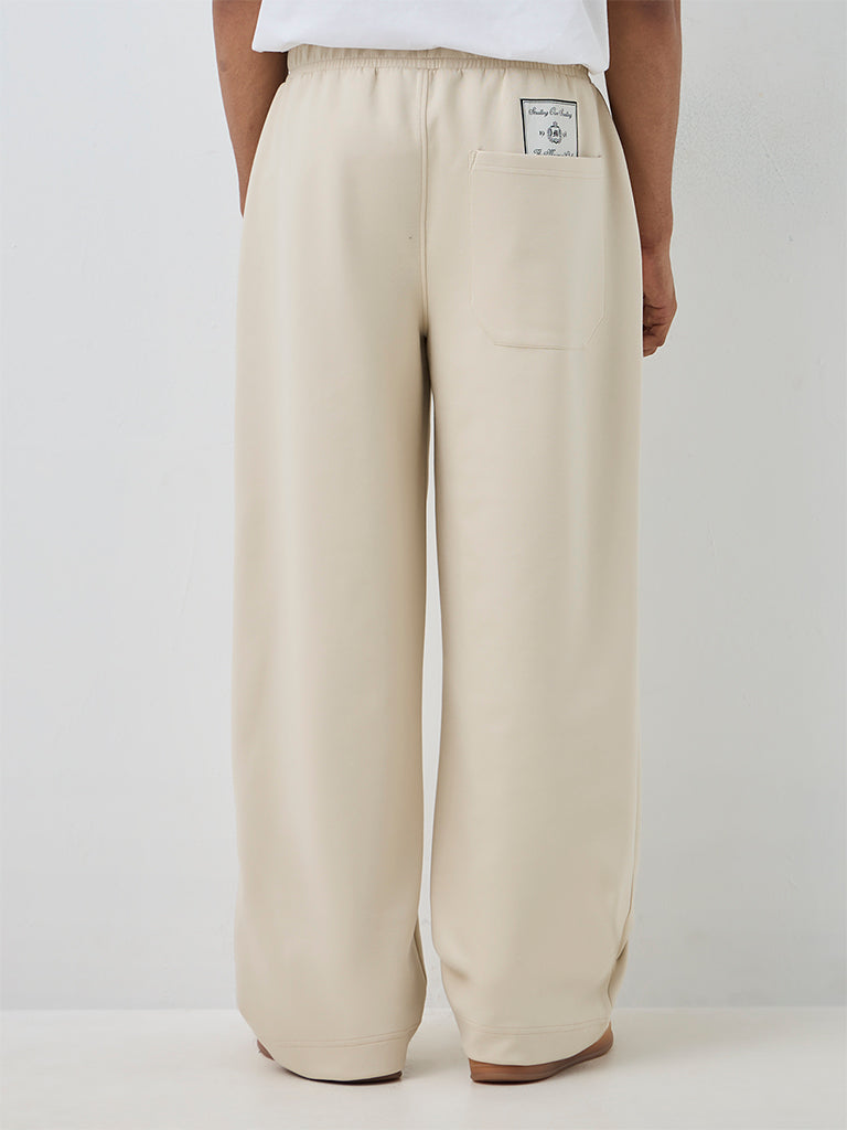 Nuoflexx Beige Solid Barrel-Fit Mid-Rise Track Pants